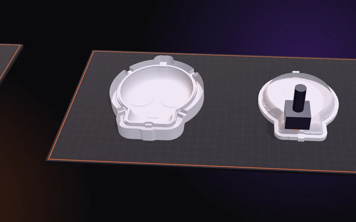 The bottom and the top mold for the skull, printed
