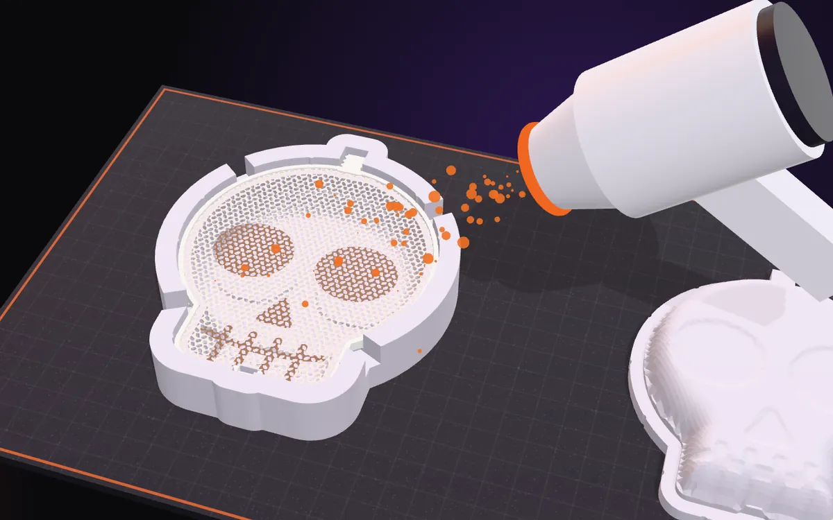 A hair dryer warming the mesh in the bottom mold